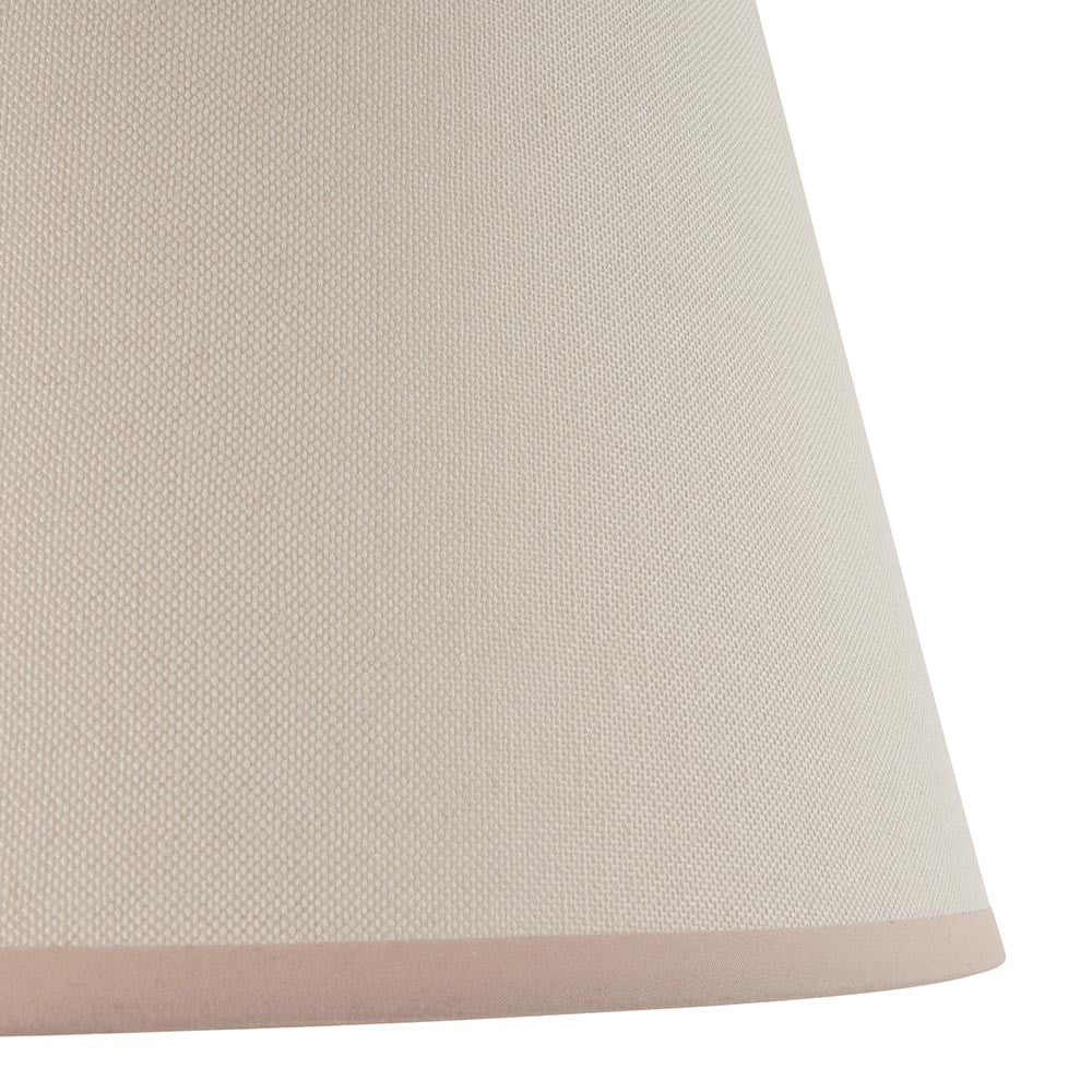 Close-up of the Endon Brockbury 35cm tapered lamp shade in vintage white cotton mix, showing the woven texture and almond white taped bottom edge.