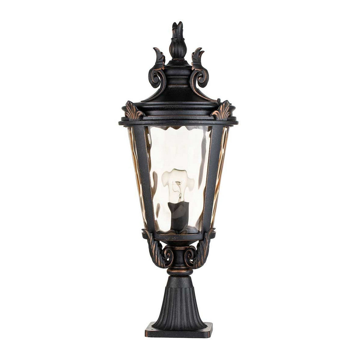 The Baltimore 1 Light Large Pedestal Lantern in weathered bronze is an ornate, vintage-style outdoor fixture with a decorative top and fluted base. It features a clear glass enclosure that showcases a single candle-shaped bulb.