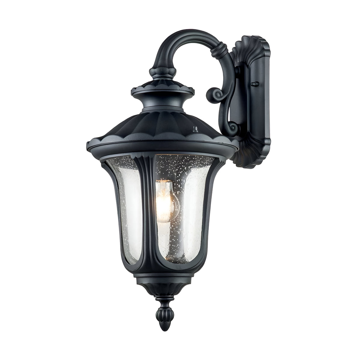 The Chicago Outdoor Medium Wall Lantern - Black exudes vintage charm with its elegant design. This outdoor lighting solution includes clear, speckled glass panels and a decorative curved arm in classic black, highlighting the visible bulb inside while enhancing any exterior space.