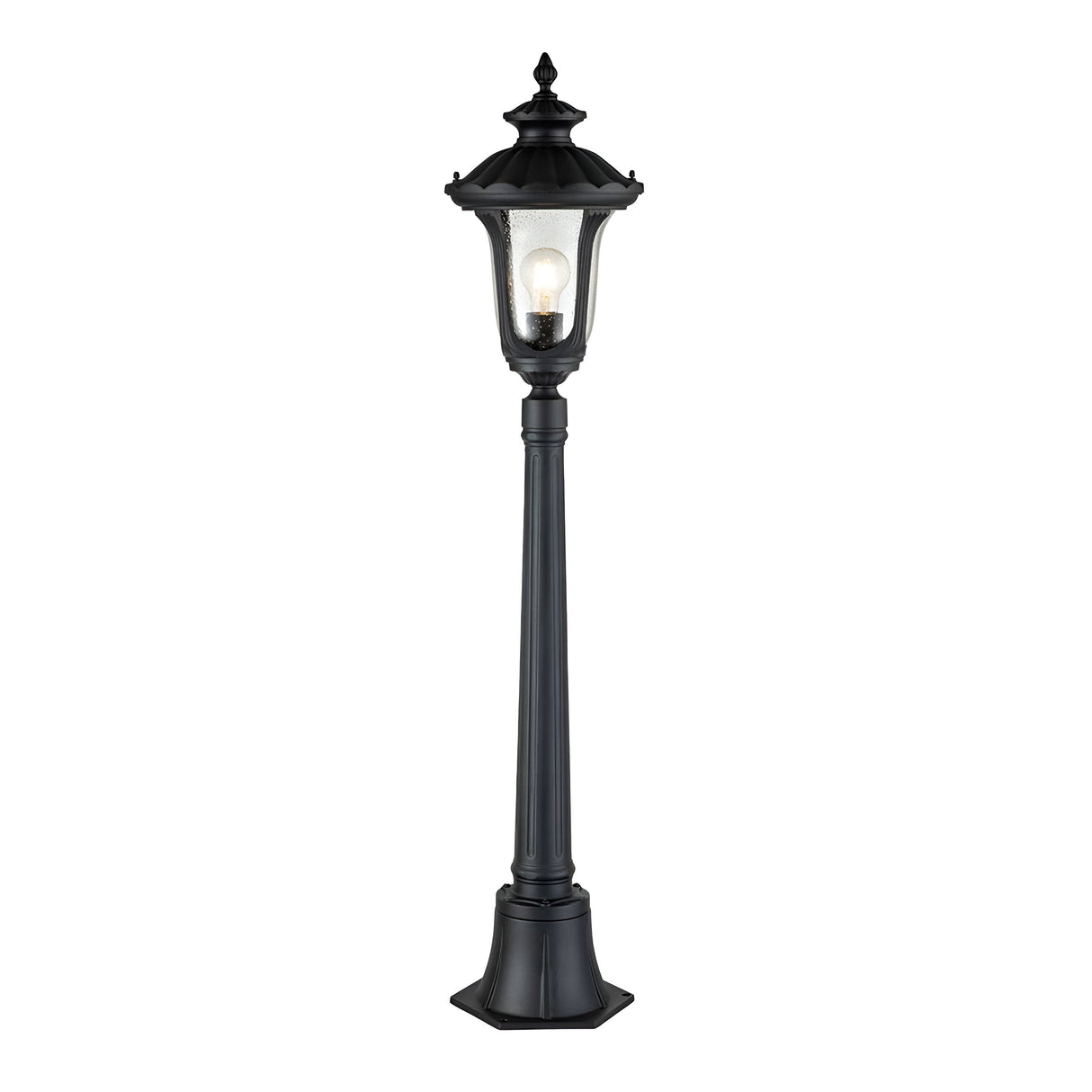 The Chicago Small Pillar Lantern - Black is a classic outdoor lamp post featuring a glass lantern that captures vintage aesthetics. Its exposed light bulb and intricate decorative elements make it an eye-catching addition to outdoor lighting, while its robust base guarantees durability.