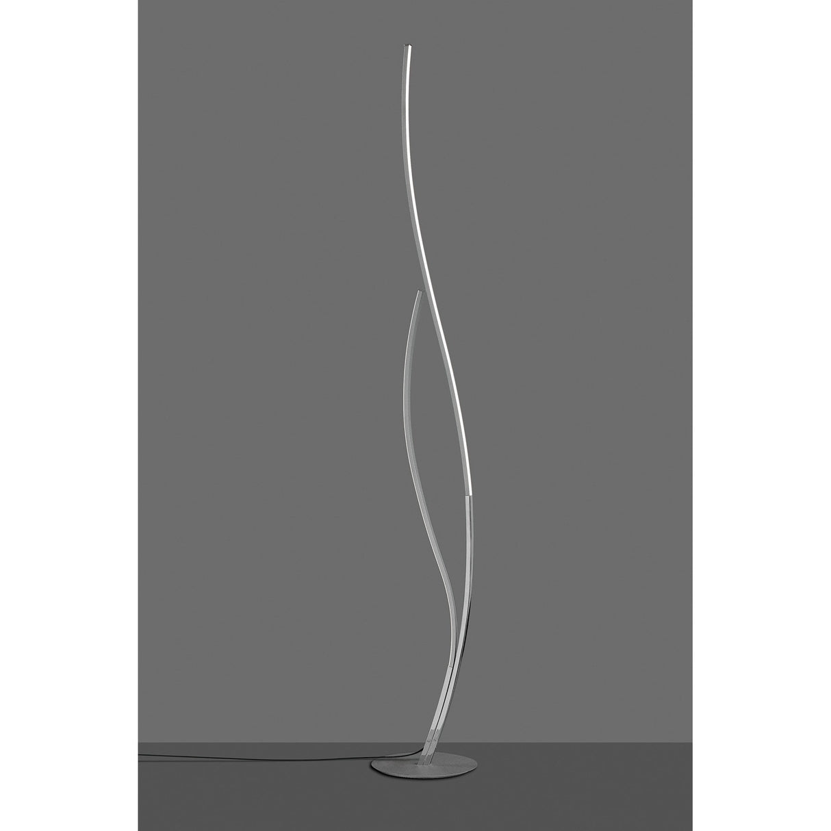 The Corinto Dimmable LED Floor Lamp 30W 3000K in Chrome features two sleek, curved metal rods rising from a round base, shown against a plain gray background.