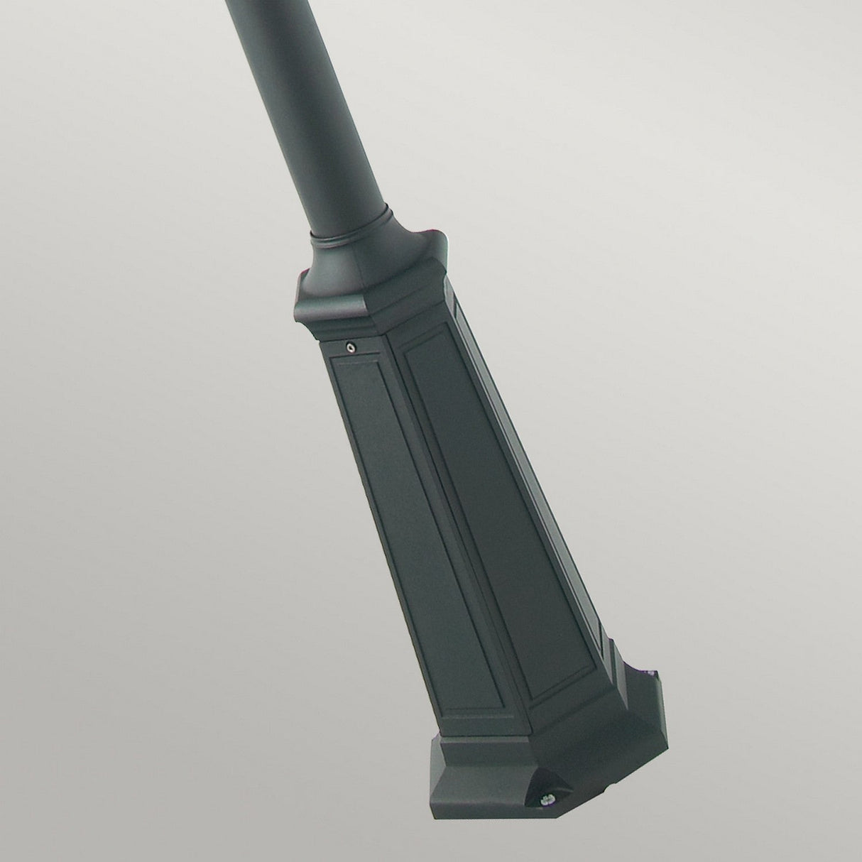 Close-up of the base of the Chelsea 1 Light Grande Lamp Post in copper and black, featuring decorative rectangular patterns on a light gray background.