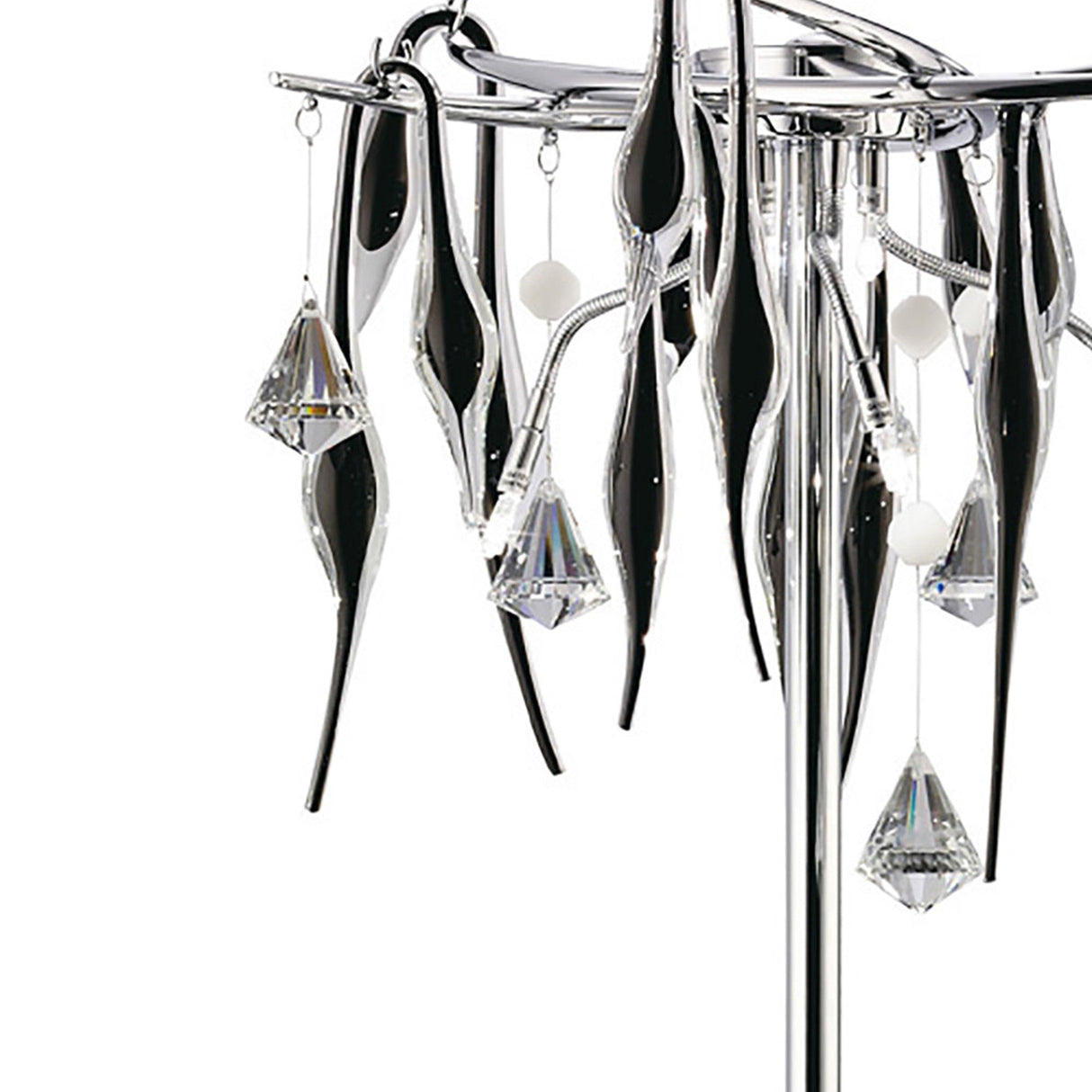 A close-up of the Cygnet 6 Light Crystal Table Lamp in chrome, featuring curved metallic arms, black glass accents, clear glass elements, hanging white spheres, and faceted crystal pendants.