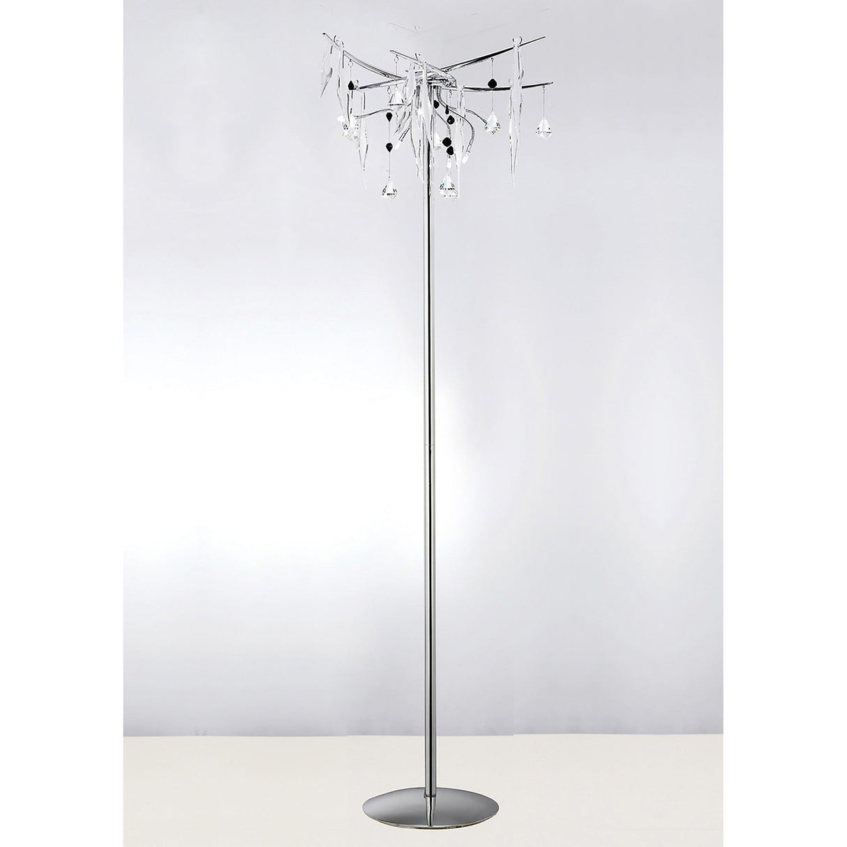 The Cygnet 6 Light Glass & Crystal Floor Lamp in chrome is a modern statement piece, featuring a slim stand and base with hanging glass and crystal accents for a contemporary chandelier effect.