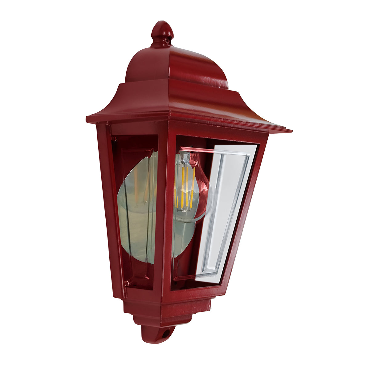 The Deco Outdoor Wall Lantern in red showcases a vintage style with a glass panel and visible light bulb. Its classic design, featuring a peaked top and rugged aluminium construction, mounts gracefully on a wall bracket to enhance any outdoor setting.