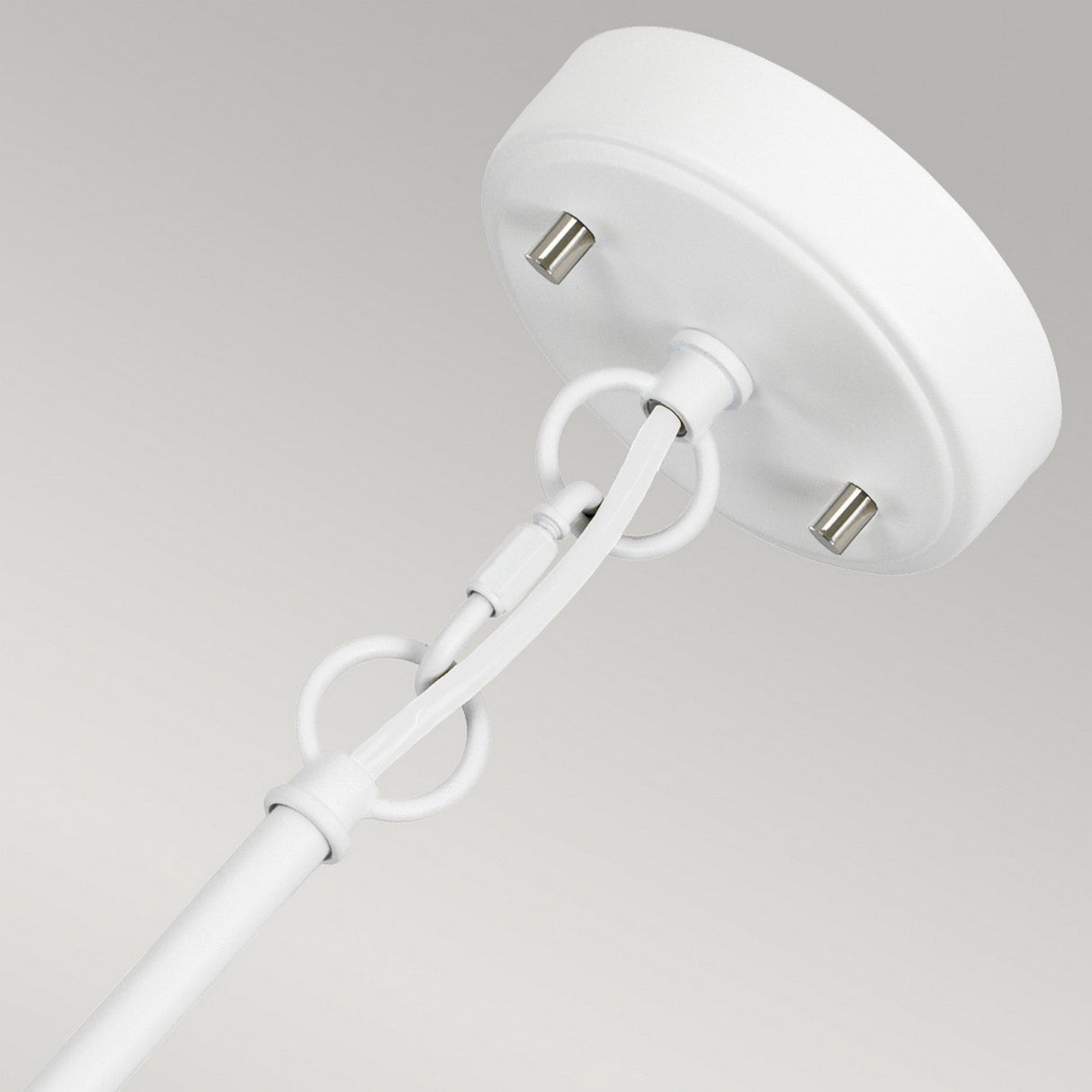 Detailed perspective of the Corona 2 Light Pendant / Semi-Flush in white satin, featuring a circular base and three cylindrical bulbs. The fixture boasts a sleek, minimalist design with interconnecting rings and a smooth finish, all set against a neutral backdrop.