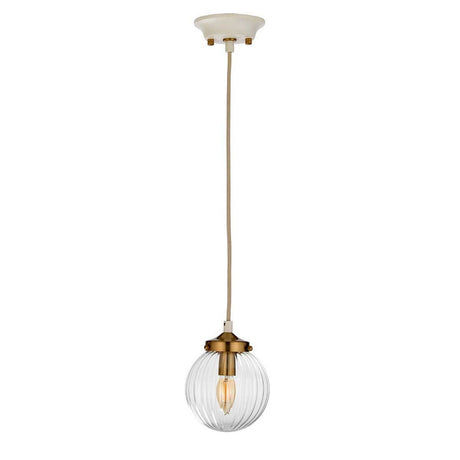 The Cosmos 1 Light Pendant features a clear ribbed, hand-blown glass shade with an exposed bulb. It showcases a gold-toned fixture accented with aged brass and includes a white ceiling mount. Suspended by a single cord, it captures a retro aesthetic.
