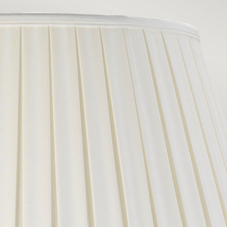 Close-up of the Dalian Table Lamp featuring a Tall Empire Shade in Celadon. The white, pleated fabric creates graceful vertical lines, giving it a timeless and classic appearance.