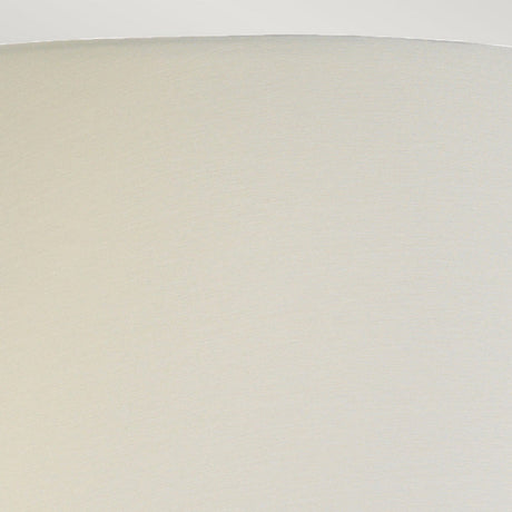 Close-up view of the plain, celadon empire shade from the Harbin Gourd Table Lamp, featuring a smooth texture against a light gray background. The image captures the curved edge and surface, emphasizing its simplicity and elegance.