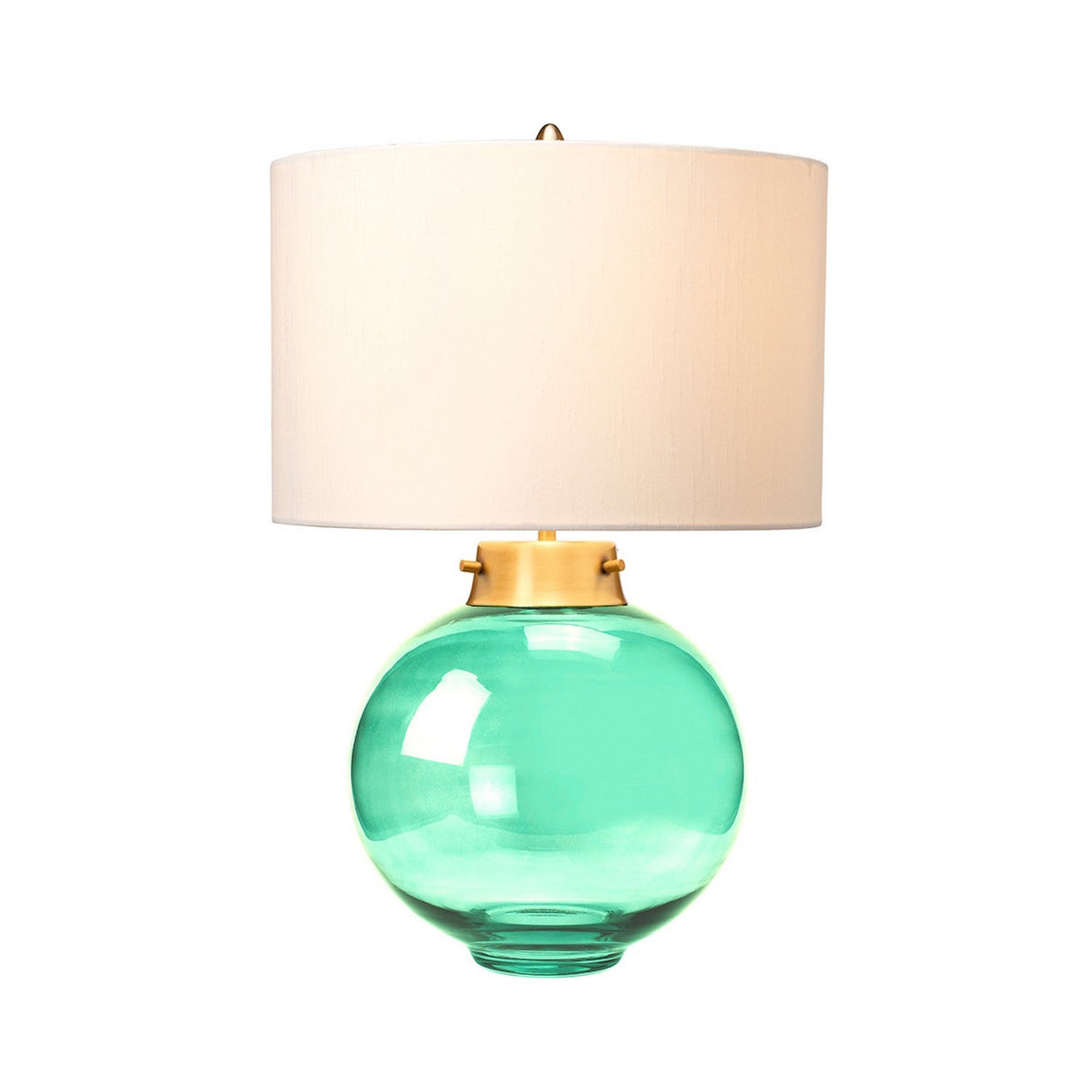 The Kara Table Lamp - Aged Brass - Dark Green Glass features a round, transparent dark green glass base with an elegant aged brass connector and is topped with a large white cylindrical fabric lampshade. The lamp is stylishly presented against a plain white background.