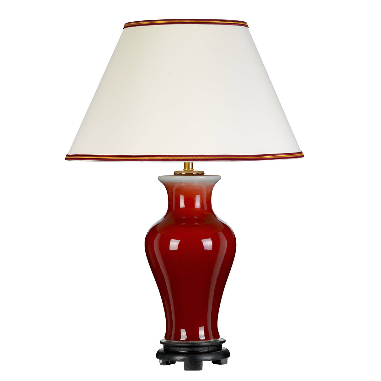 The Majin Table Lamp with Tall Empire Shade - Oxblood features a glossy red ceramic base with an oxblood finish, complemented by a red-trimmed empire shade and supported by a black circular stand.