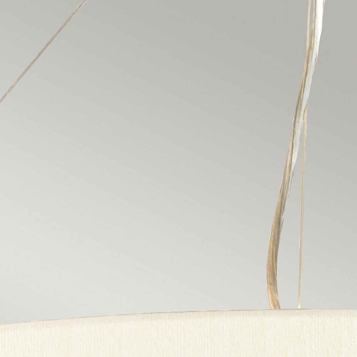 A close-up view showcases the Pearce 34" Pendant Light against a plain gray backdrop, highlighting its elegant contemporary design with a curved ivory shade and thin, vertical metallic rods in aged brass extending upward.