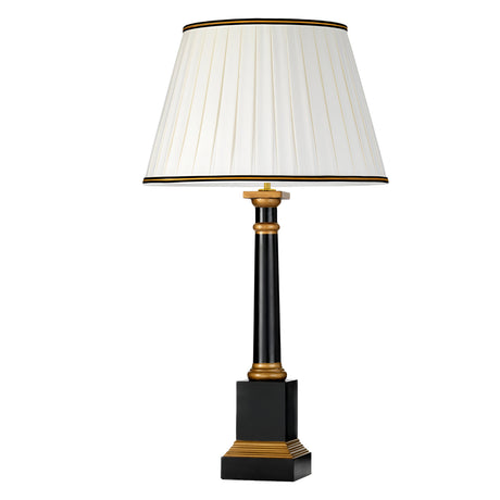The Peronne Table Lamp with its tall black and gold base is elegantly paired with a classic empire shade. Its striking square design features gold accents, offering a sophisticated and stylish appeal.