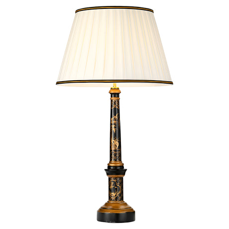 The Strasbourg Table Lamp with a tall empire shade features a pleated white cover and a black and gold base decorated with intricate floral patterns.
