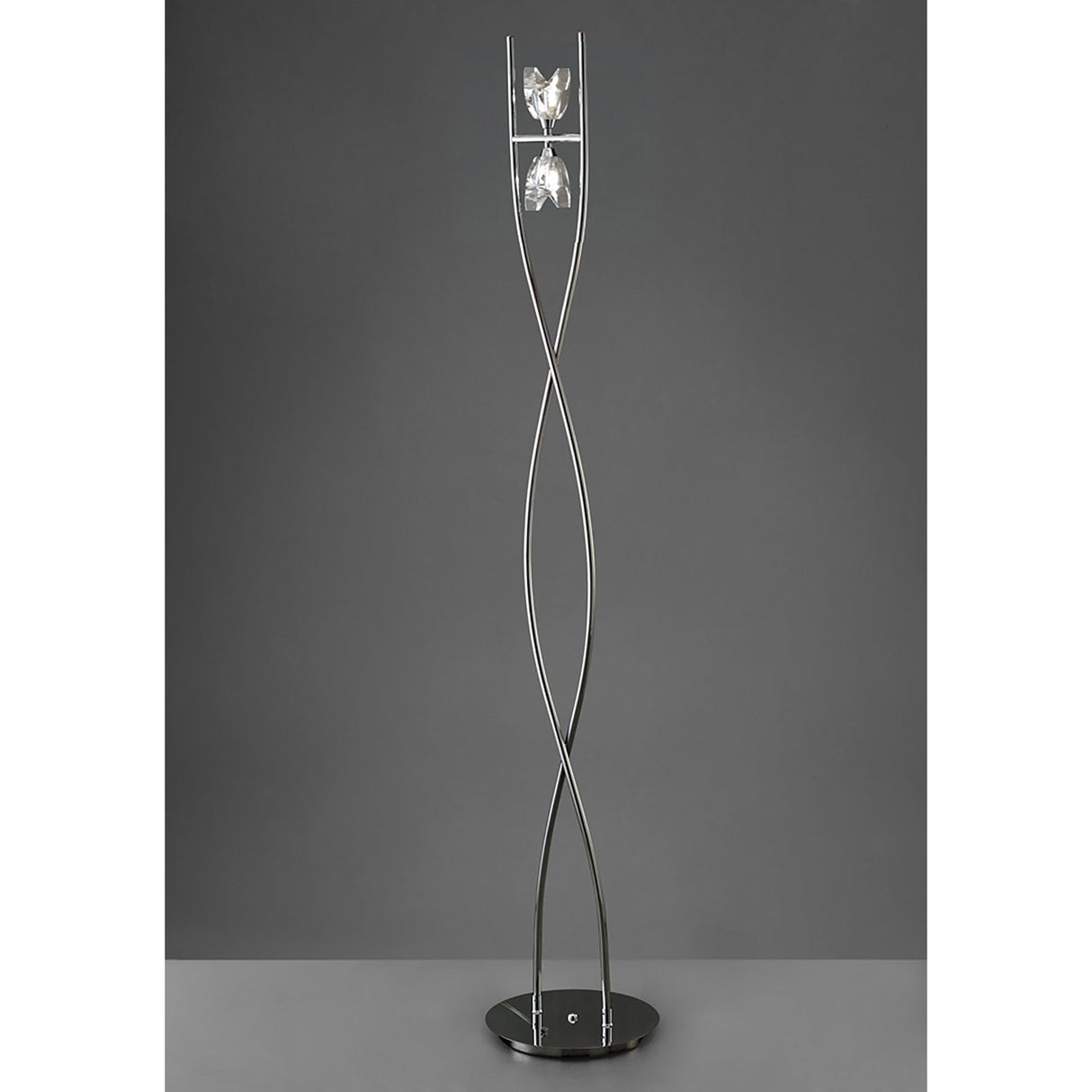 The Eclipse 2 Light Floor Lamp features a black circular base and two polished chrome rods that twist upward, each holding a glass light fixture for ambient lighting, shown against a plain gray background.