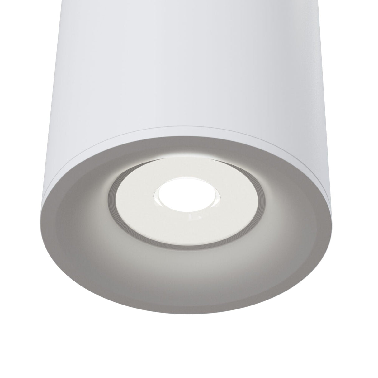 Close-up view of the Slim Round Flat Surface Mounted Downlight - White, featuring a recessed circular LED bulb at the center, set in smooth white finish aluminium construction.