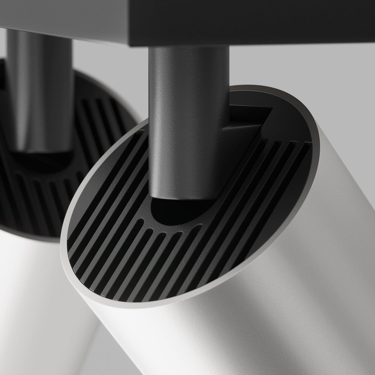 Close-up of FOCUS S Twin Bar Spotlight in black and matte silver, focusing on its dual-bar design and matte silver finish