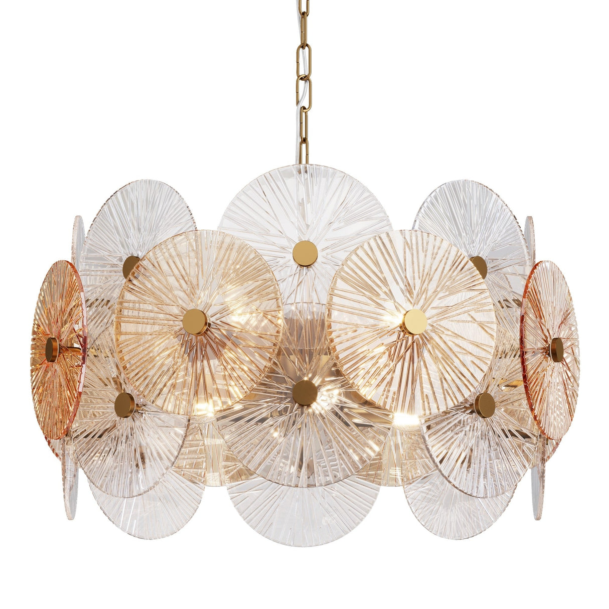The Aster 8 Light Chandelier - Gold showcases a round design with overlapping clear and amber glass plates on a brass metal frame. Textured lines form a starburst effect, blending modern aesthetics as it elegantly hangs from a brass chain.