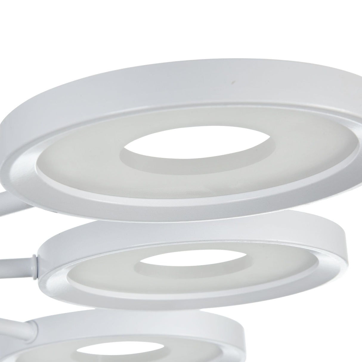 The Aprilia LED Ceiling Light - White features modern elegance with energy-efficient circular LED rings in a sleek finish. Its overlapping design adds minimalist style, ideal for contemporary interiors.