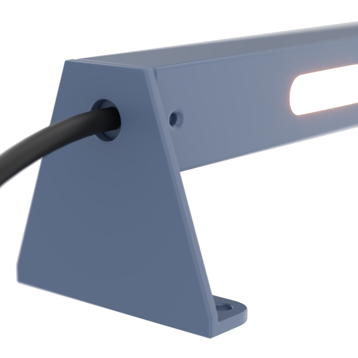 The Edge Outdoor Landscape LED Ground Light - Graphite is a modern, blue triangular bracket with a black cable on one side. It supports a horizontal bar emitting soft light from a rectangular cutout, featuring a sleek design and 3000K LED lamp.