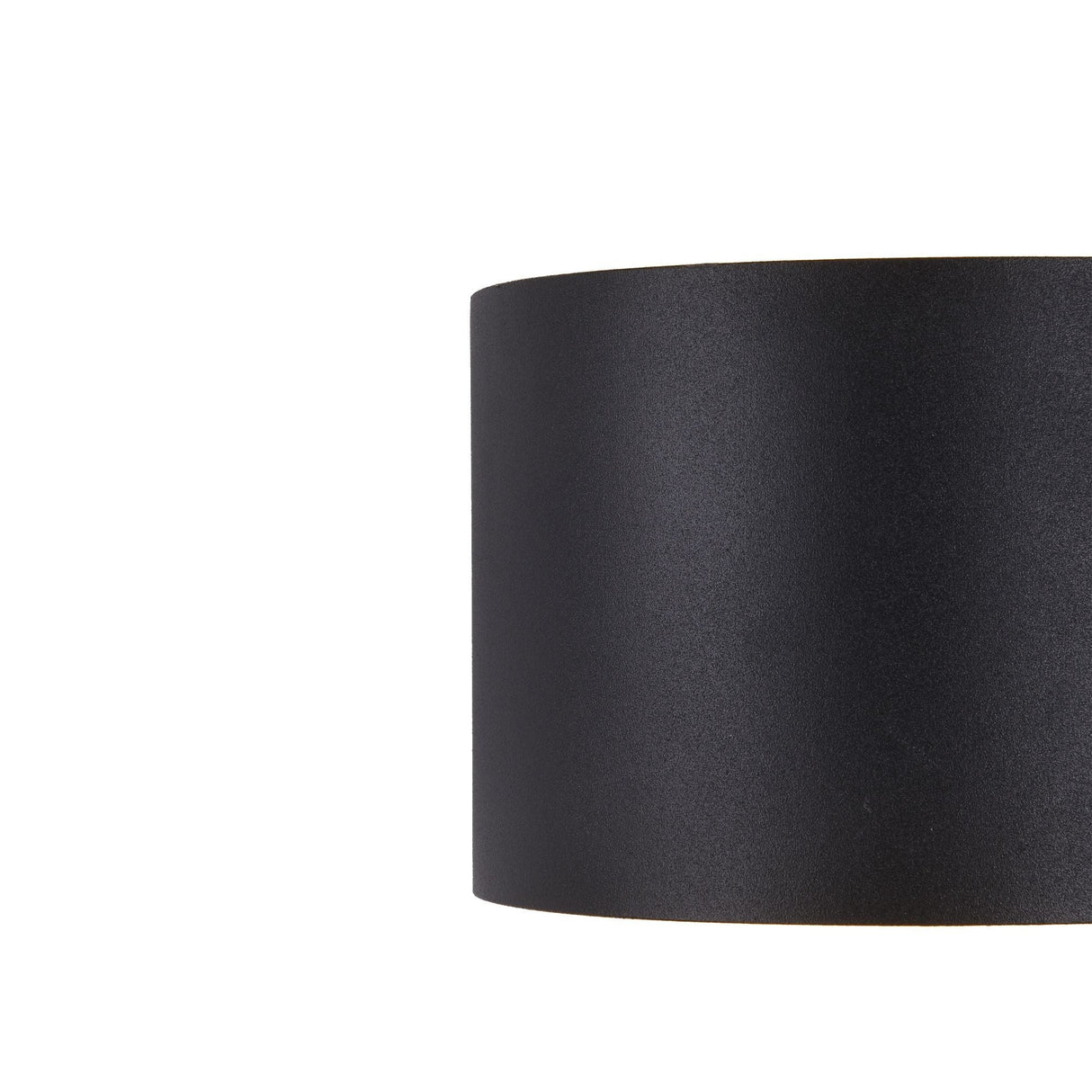 Close-up of a black cylindrical part of the Fulton Outdoor LED Oval Wall Light against a white background. Its smooth, matte, corrosion-resistant aluminum has a slightly curved left side, enhancing the sleek and modern design ideal for versatile outdoor lighting.