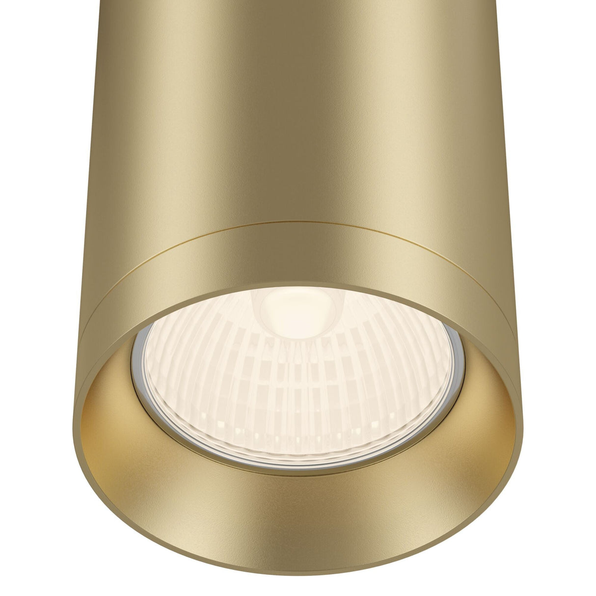 Close-up of the Shelby 1 Light Pendant in matte gold, turned on and emitting a soft glow. The modern fixture features a textured inner surface around the bulb.