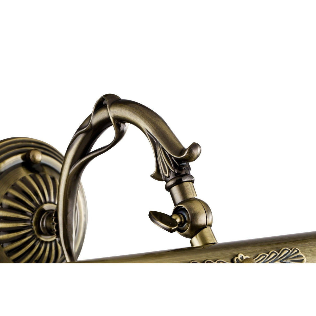 A close-up image features an ornate, antique-style brass faucet with a decorative wall mount and elegantly curved handle. Its intricate detailing shines under accent lighting, its bronze finish reminiscent of the Picasso Classic Picture Light. The background is white.