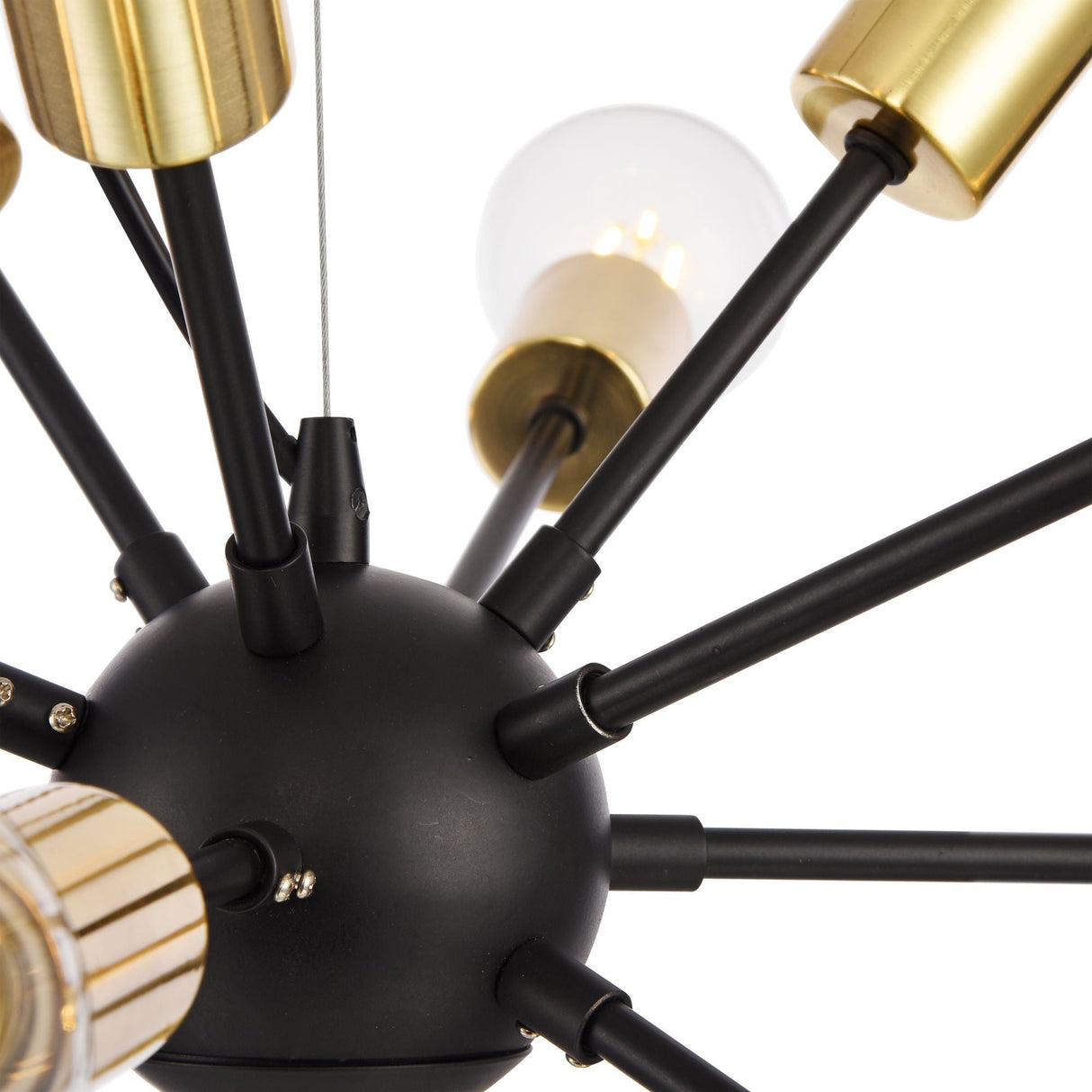 Close-up of the Jackson 12 Light Chandelier - Black, showcasing a spherical center with black rods radiating outward. Gold cylindrical sockets hold each bulb, blending modern and contemporary styles in its sleek design.