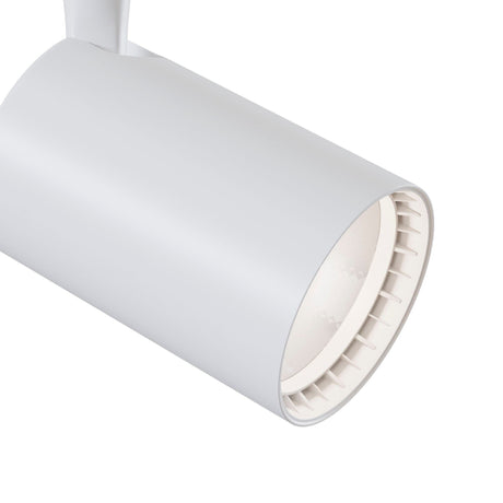 A close-up view of the Vuoro LED Single Phase Unity Track Spotlight 10W 3000K - White, showcasing its modern white cylindrical structure with a smooth finish, highlights the sleek and minimalistic design of this open-ended fixture.