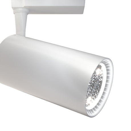 Close-up of the Vuoro LED Single Phase Unity Track Spotlight in white, featuring a 36W 3000K illuminated LED bulb. This modern cylindrical track light offers a sleek, minimalist design with an adjustable swivel feature against a plain white background.