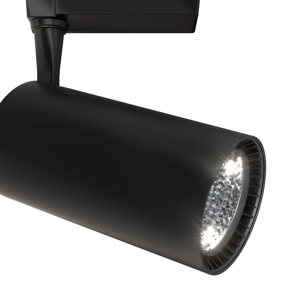 A close-up shows the Vuoro LED Single Phase Unity Track Spotlight 36W in black, emitting bright, focused light at 4000K through a narrow beam angle. The energy-efficient fixture is mounted on a matching black track against a plain, dark background.