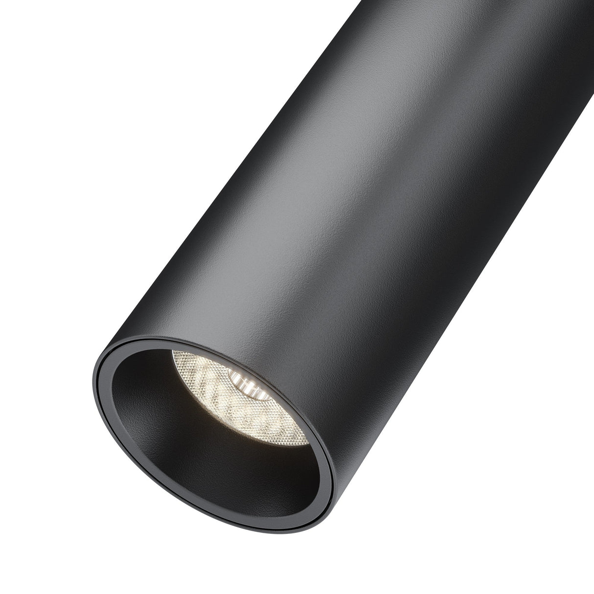 Close-up of the sleek Focus LED S35 Magnetic Track Spotlight, 7W in black, with a cylindrical design. It features a downward-angled textured lens that highlights its minimalist style. Ideal for contemporary settings, it offers energy-efficient illumination at 4000K.