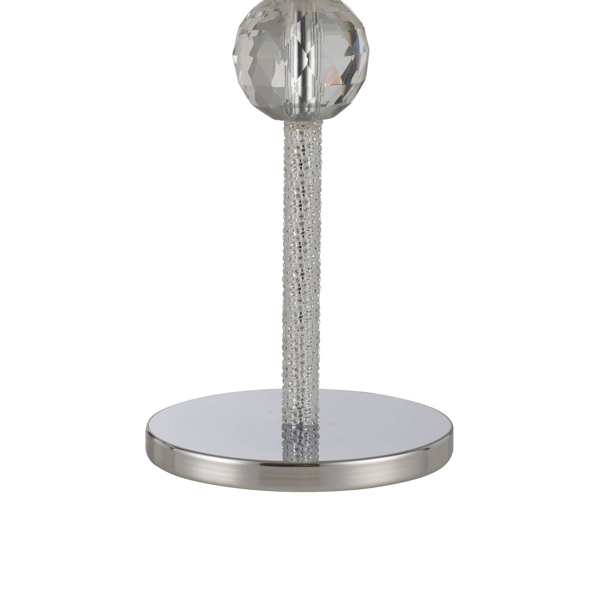 A close-up of the Elena 1 Light Crystal Table Lamp - Chrome (Without Shade) shows its round, reflective chrome base, textured cylindrical stand, and a faceted crystal sphere near the top.