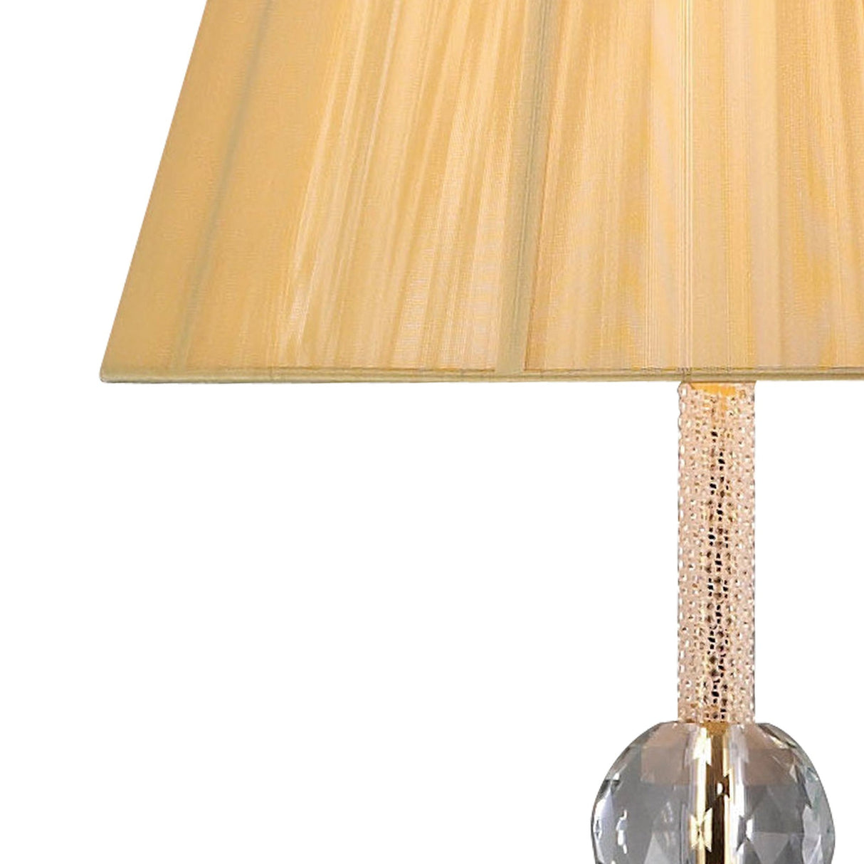 A close-up of the Elena 1 Light Crystal Floor Lamp in gold, featuring a textured metallic stem and a clear faceted glass base, captures its luxurious elegance against a white background.