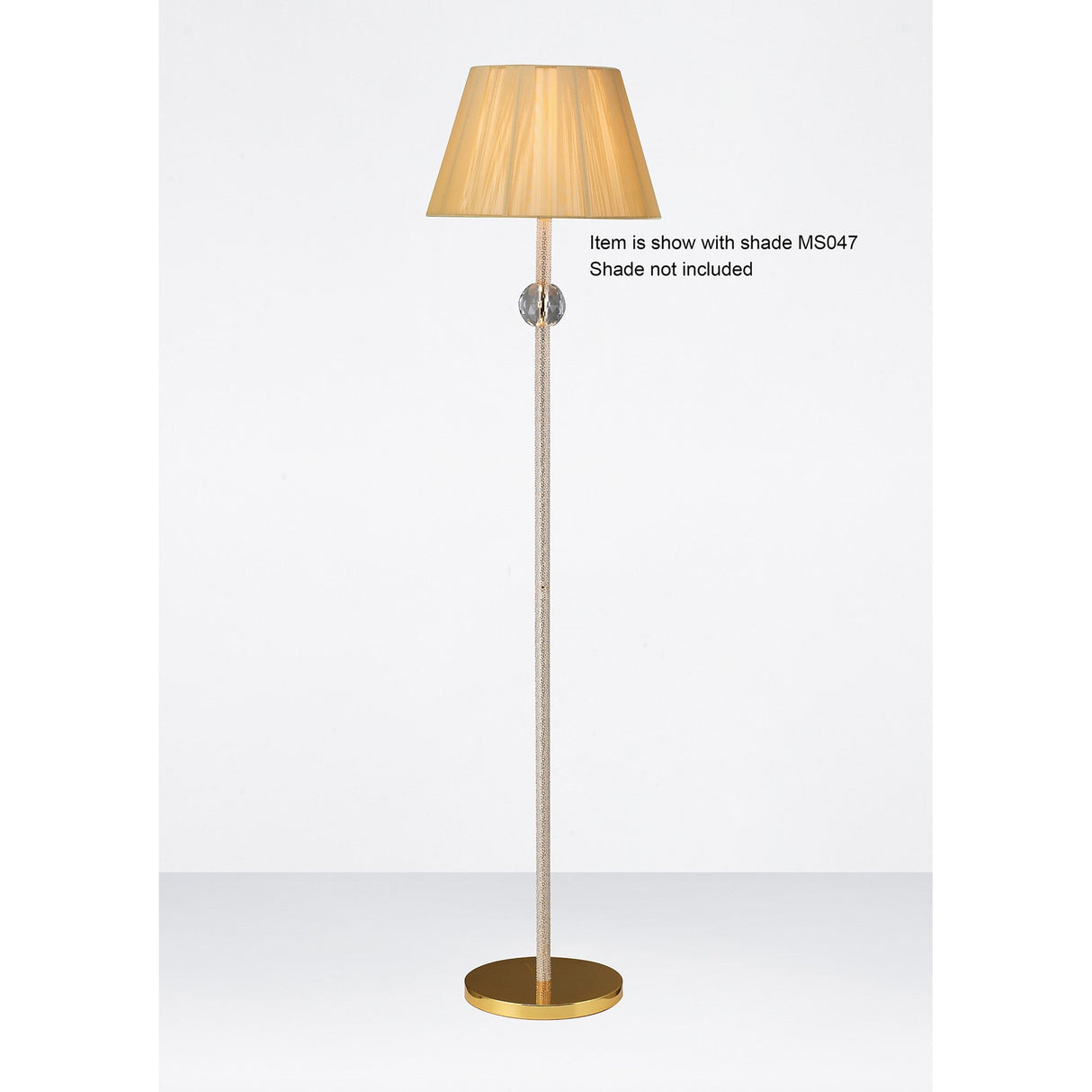 The Elena 1 Light Crystal Floor Lamp - Gold (Without Shade) features a tall crystal body, slim metallic stand, and round base. Image text: Item is shown with shade MS047. Shade not included. Background is plain white.