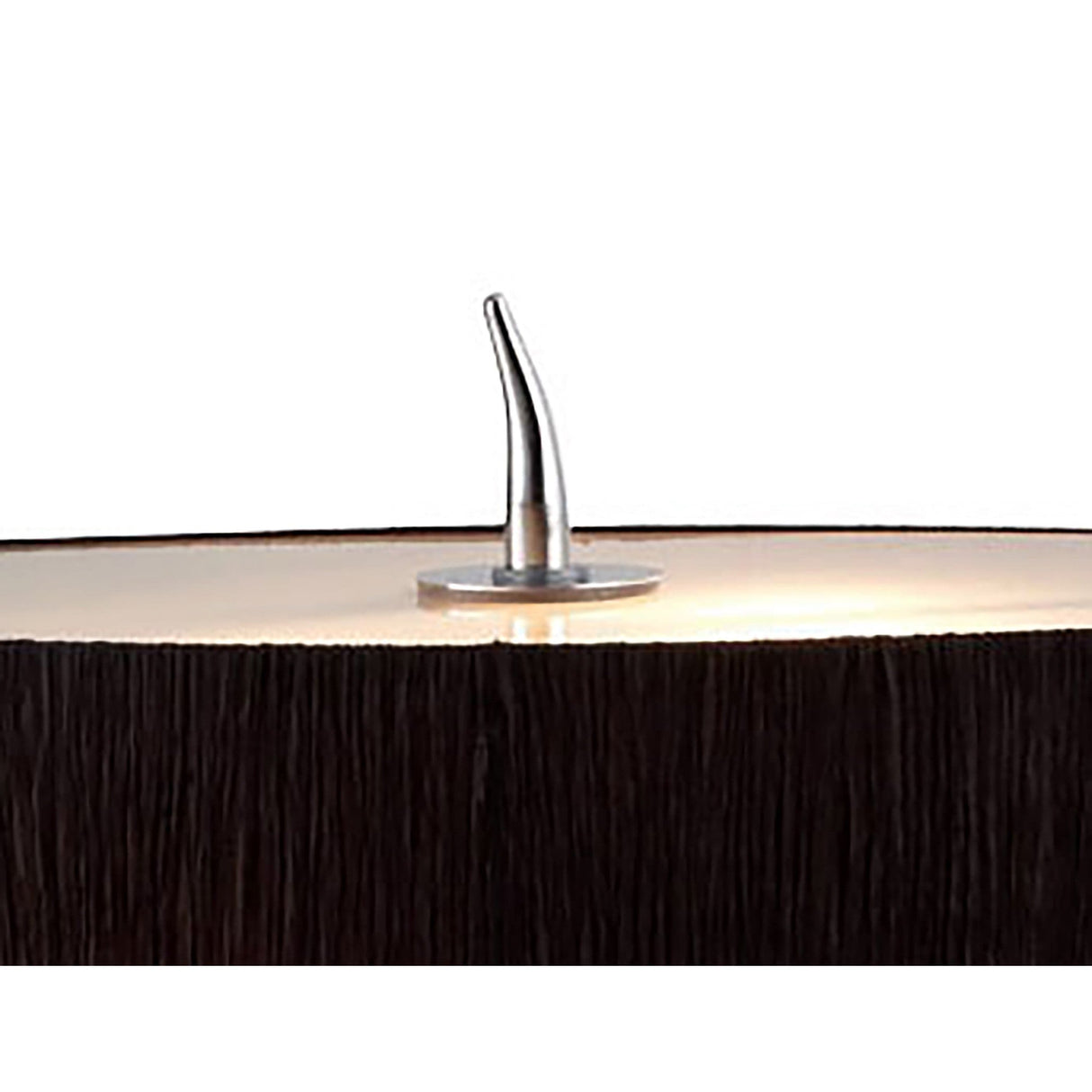 Close-up of a large, dark brown candle with a textured surface and shiny curved metal wick—evoking the sleek look of the Eve 2 Light Table Lamp in polished chrome with black oval shade—set against a plain white background.