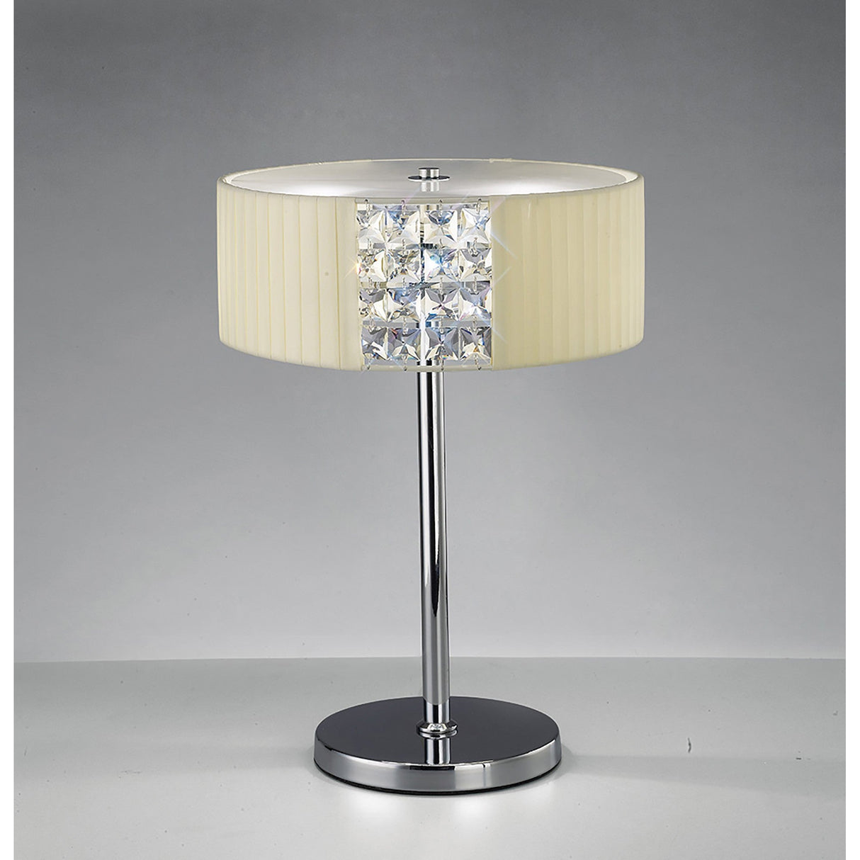The Evelyn 2 Light Crystal Table Lamp features a shiny chrome base, vertical crystal accents, and a cylindrical cream shade for a modern touch of luxury lighting.
