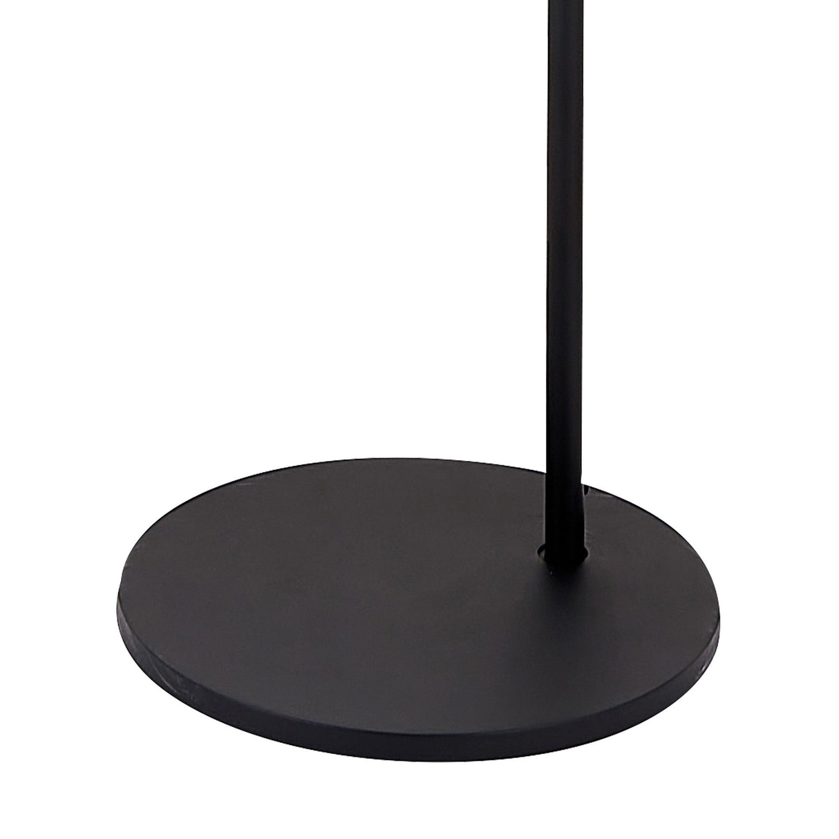 A close-up of the round, flat base and vertical pole of the Eyes LED Floor Lamp 6W 3000K in Sand Black, showcasing its modern design.