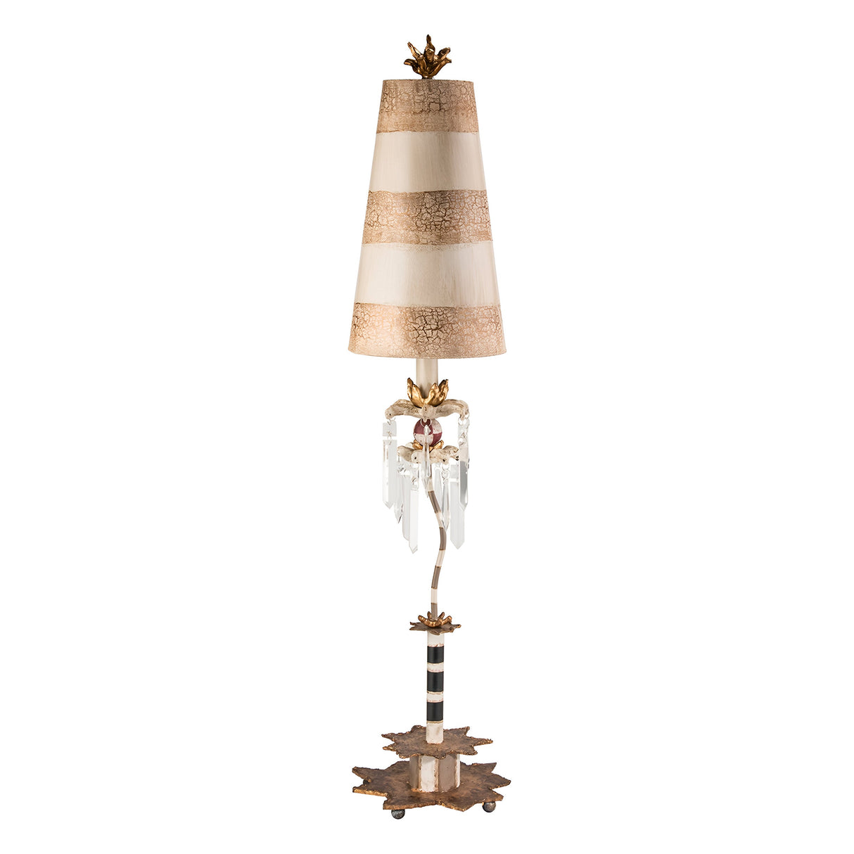 The Birdland 1 Light Table Lamp in cream and gold features an ornate design with a conical, striped shade in beige and gold atop a slender black and white pole. Its crackled putty-finished base is adorned with leaf motifs, while K9 cut glass accents elegantly dangle beneath the shade.
