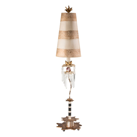 The Birdland 1 Light Table Lamp in cream and gold features an ornate design with a conical, striped shade in beige and gold atop a slender black and white pole. Its crackled putty-finished base is adorned with leaf motifs, while K9 cut glass accents elegantly dangle beneath the shade.