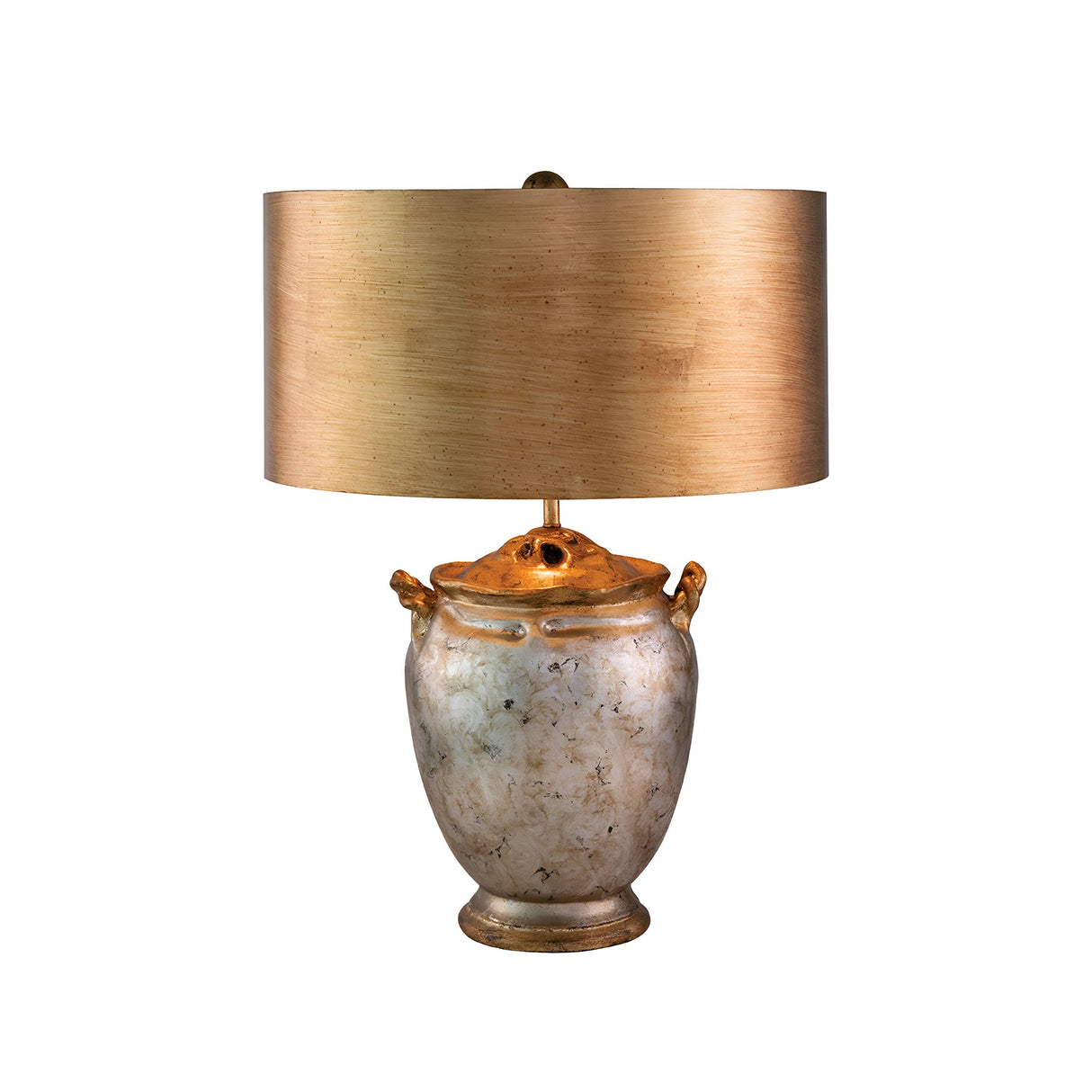 Introducing the Jackson 1 Light Table Lamp, featuring a rustic urn-shaped base crafted from aged metal and adorned with two small handles. The base boasts an antiqued silver finish, enhanced with elegant gold leaf accents to amplify its charm. Topped with a large, cylindrical beige lampshade that features a subtle texture, this lamp perfectly complements its antique-style design.