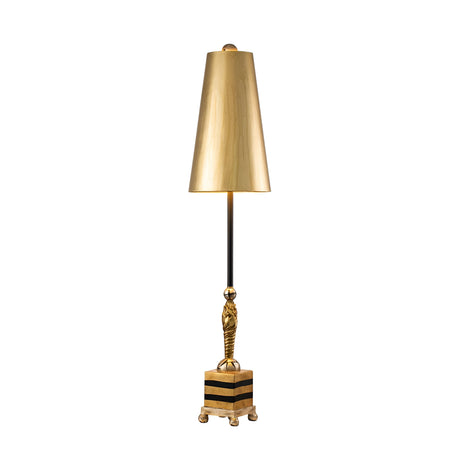 The Noma Luxe 1 Light Table Lamp in Gold, Black & Silver Leaf is a tall, elegant piece featuring a sleek gold leaf shade. It has a slender black stem adorned with a decorative gold figure and rests on a square base with striped gold and black patterns, making it the perfect decorative accent.