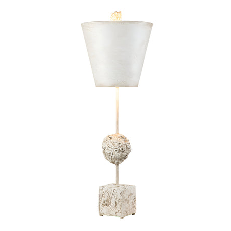 The Petra 1 Light Table Lamp - Bone White boasts a vintage design with a tall structure complemented by a textured white lampshade. Its ornately detailed base features an enchanting owl design, sitting gracefully on a square, engraved stand. This lamp beautifully combines classic charm with modern aesthetics.