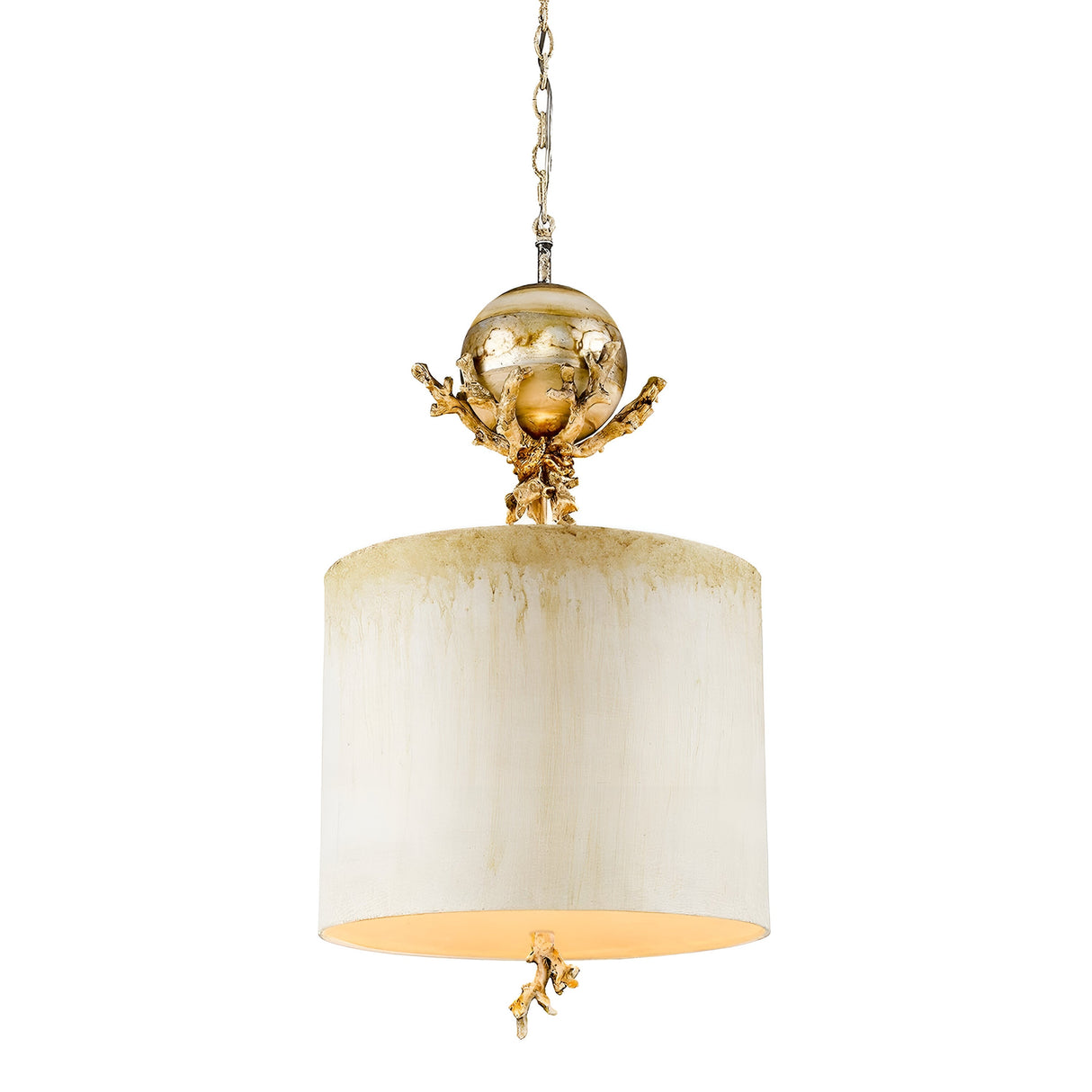 The Trellis 1 Light Pendant in Putty Patina and Silver Leaf showcases a luxurious chandelier design, featuring an elegant white cylindrical lampshade suspended from a chain. Above the shade, the piece boasts an ornate gold-toned sphere adorned with a silver leaf orb element and decorative branches, seamlessly combining sophistication and artistic flair.
