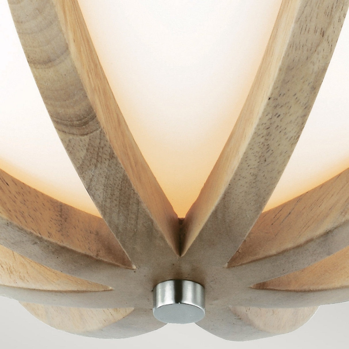 Close-up of the Allier 2 Light Flush fixture, showcasing a round, opaque white shade enclosed by light wood slats and accented with a small brushed steel cap at its center.