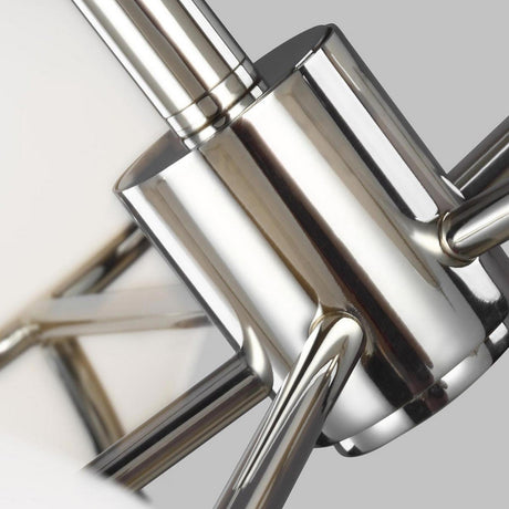 A detailed view of the Apollo 5 Light Chandelier - Polished Nickel, showcasing its gleaming silver finish. The image emphasizes the modern, elegant design and the smooth metallic surfaces complemented by opal etched glass globes set against a neutral background.