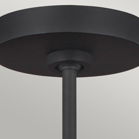 Close-up of the Asher 5 Light Pendant in Midnight Black & Gold, featuring a sleek cylindrical base and rod with an industrial-inspired design against a light gray background.