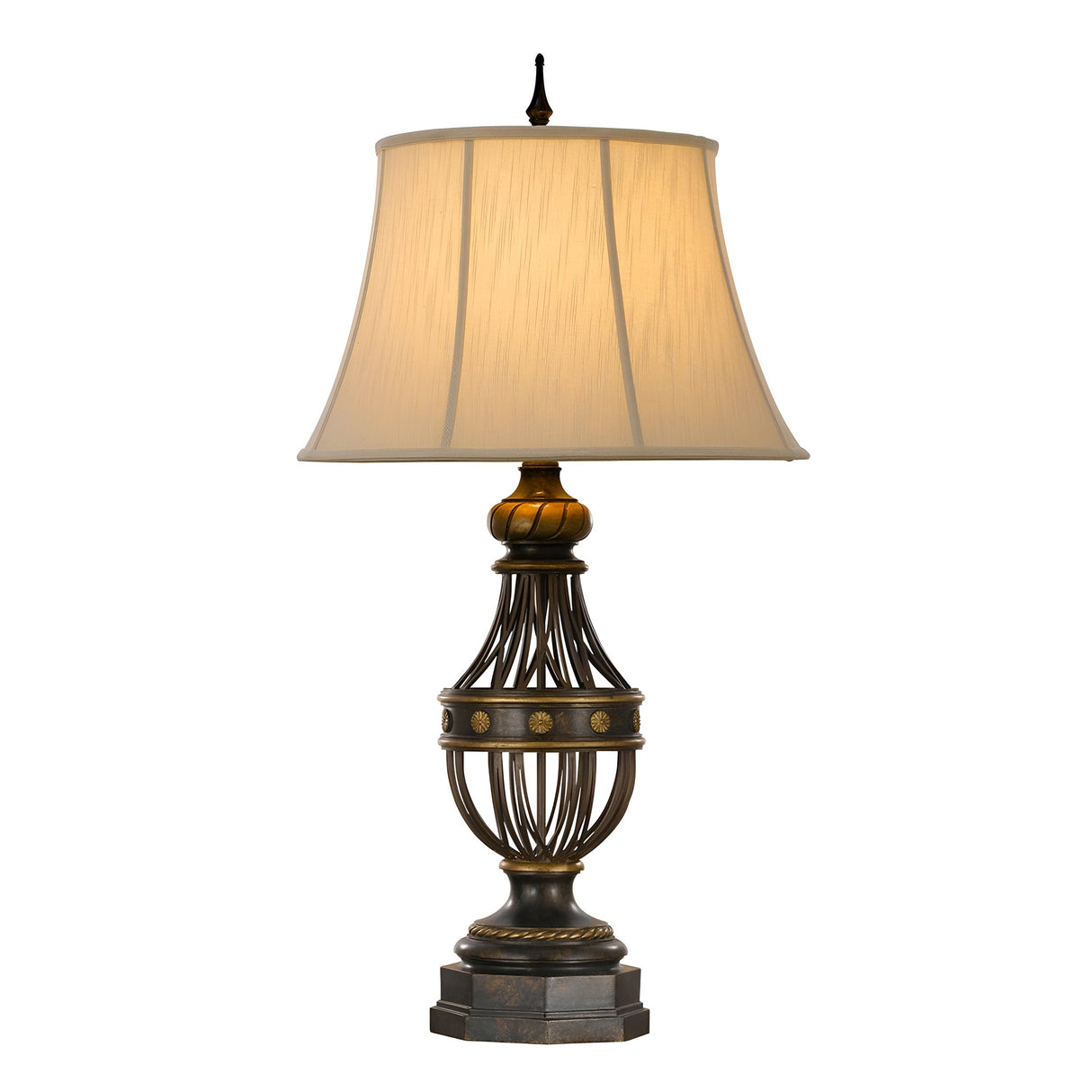The Augustine 1 Light Table Lamp in Antique Brown features a vintage-style design, complete with a beige fabric lampshade and an ornate bronze base adorned with decorative detailing and a round central design. Ideal for transitional interiors, this classic piece emits a warm glow when illuminated.