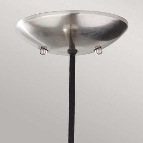 Close-up of the Beso 1 Light Mini Pendant in a retro design, featuring a modern brushed steel finish. Its round canopy is accented with two small knobs, and a sleek black rod extends downward to support the fixture against a neutral background.