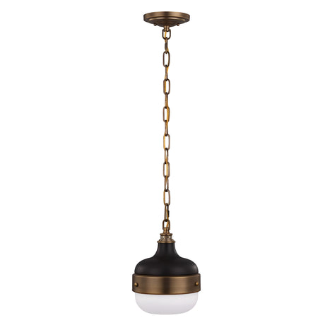 Introducing the Cadence 1 Light Mini Pendant in Dark Antique Brass and Matte Black. This elegant fixture boasts a round, modern design with a white glass shade at its base. It hangs from a brass chain attached to the ceiling mount, offering a vintage-industrial charm to any room.